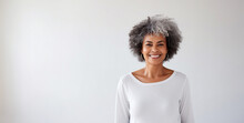 Portrait Of Smiling Proud Handsome African American Senior Woman Standing Against Isolated White Background. Wearing A White T-shirt Copy Space For Advertisement Or Logo