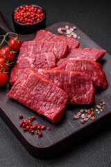 Wall Mural - Fresh juicy raw beef slices with salt and spices