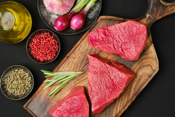 Wall Mural - Flat lay composition with raw strip steak boneless