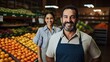 Hispanic couple of workers in supermarket