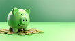 © mozZz - Green pig piggy banks with a smile on a stack of gold coins, isolated on green background - Green investment success, eco savings concept