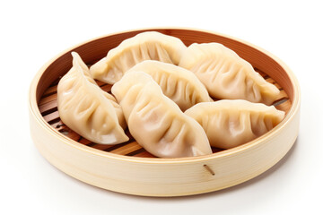 Poster - Handmade Asian dumplings in bamboo steamer isolated on a white background 