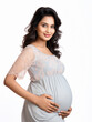 © PRASANNAPIX - Indian pregnant woman holding hands on her stomach and feeling happy
