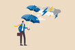 Extra protection for thunderstorm ahead, business protection or insurance, resilience or shield to survive crisis situation concept, businessman holding double layers umbrella to protect against storm