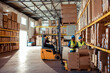 © Marko Geber - Wide angle view of diverse workers in a warehouse