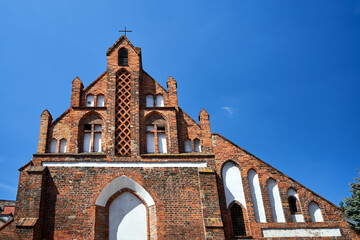 Wall Mural - fragment of the facade of a medieval Gothic church in Poznan