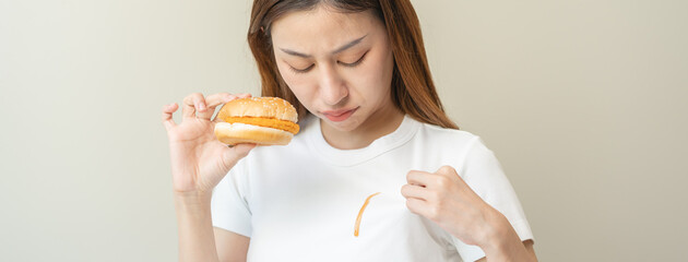 Wall Mural - dirty food mark on clothes,Close-up stain spill sauce on the shirt by incident.