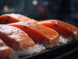 Several perfect fresh raw Salmon steaks on ice. Fish market or supermarket counter with steak pieces of salmon or pink salmon or chum salmon or nelma or nerka. Food source of omega 3 and healthy fats