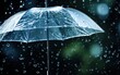© Tisha - Transparent umbrella under rain against water drops splash background