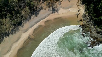 Wall Mural - Aerial views of tropical beach and ocean waves in Coffs Harbour, New South Wales, Australia