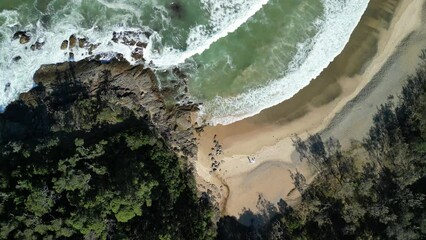 Wall Mural - Aerial views of tropical beach and ocean waves in Coffs Harbour, New South Wales, Australia