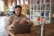 © ReeldealHD images - Young adult male working from home on a video call