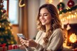 © useful pictures - Happy smiling young woman sit near Christmas tree use cellphone look in distance making wish. Smiling young female enjoy New Year winter holiday at home, dreaming or visualizing of joyful future.