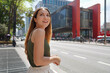 © zigres - Portrait of beautiful confident Brazilian woman in front of the MASP on Paulista Avenue, Sao Paulo, Brazil