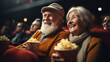 Cheerful senior couple with popcorn at cinema. elderly people.generative ai