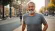 © tanya78 - Elderly man jogging in the city