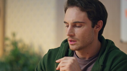 Wall Mural - Pensive creator holding ball thinking office close up. Man waiting inspiration