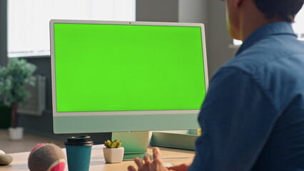 Wall Mural - freelancer video chatting mockup monitor workplace. businessman chromakey device
