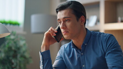 Wall Mural - Emotional manager yelling smartphone call at cabinet closeup. Man talking mobile