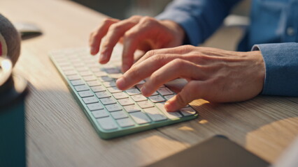 Wall Mural - businessman hands typing keyboard office close up. freelancer working computer