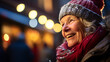 © boti1985 - elder woman standing at Christmas market looking at christmas decoration with blurred background