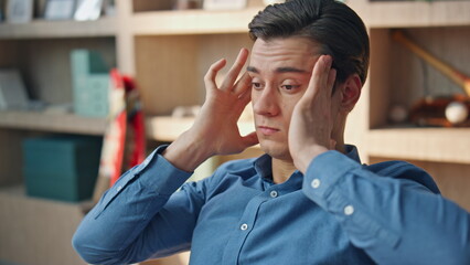Wall Mural - Overworked manager rubbing temples having headache office closeup. Man suffering