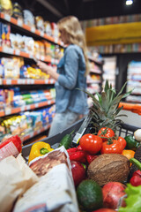 Wall Mural - Woman at the supermarket