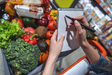 Wall Mural - Woman at the supermarket