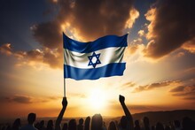 Israeli Flag Over A Crowd Of People. National Unity Concept. Background With Selective Focus And Copy Space
