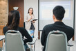 © mnirat - University College instructors and advisors meet female college students to advise their research study. University in classroom campus, college professor teacher and asian students discuss, teamwork