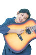 cute Thai girl happily plays the guitar 
