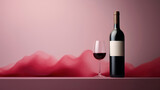 Fototapeta  - Red wine bottle with a glass on a simple dark pink empty background