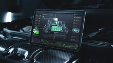 Digital tablet computer screen shows 3D visualization of real-time car diagnostics in professional software with 3D virtual electric vehicle prototype. Concept of modern car developing technology.