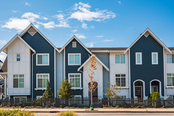 New Modern Apartment Buildings in Vancouver BC. Canadian modern residential architecture. New townhouses on a sunny day