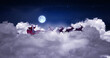 Image of christmas santa claus in sleigh with reindeer over clouds and full moon