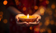 Diwali light at night with Hans holding and bokeh background, Diwali is traditional festival