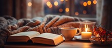 Hygge Ambiance At Home Assortment Of Cookies Vintage Books Glasses Hot Drink Candle And Fairy Lights