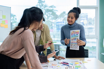 Wall Mural - team of ux developer and ui designer brainstorming interface wireframe design. creative digital deve