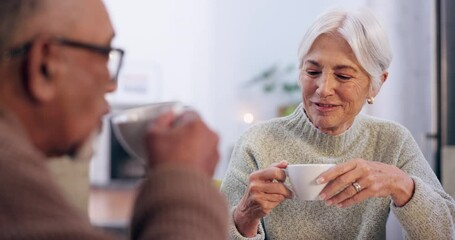 Wall Mural - Mature, coffee or happy couple toast in home living room bonding or talking in a marriage together. Interracial, drinking morning tea or woman speaking to a romantic senior man in retirement to relax