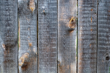 Wall Mural - Wooden background of several old boards nailed side by side.