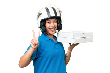 Wall Mural - Pizza delivery Argentinian woman with work uniform picking up pizza boxes over isolated background smiling and showing victory sign