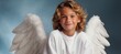 Child in a Yuletide angel costume