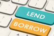 © tang90246 - Lend and borrow word on white keyboard