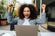 Happy woman feeling winner rejoicing online win got new job opportunity, overjoyed motivated mixed race girl student receives good test results on laptop celebrating admission