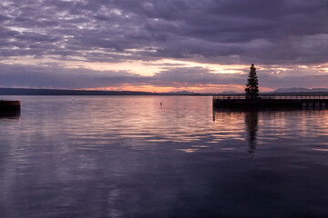 Wall Mural - Sunrise in Yellowstone lake in September 