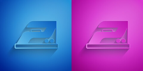 Poster - Paper cut Electric iron icon isolated on blue and purple background. Steam iron. Paper art style. Vector