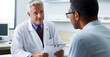 © marimalina - doctor talking to patient