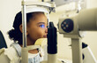 © N F/peopleimages.com - Child, eye exam and optometry for medical, vision and healthcare consultation or glaucoma check. Young client or girl kid with laser technology, blue light or machine scanning and ophthalmology test