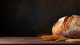 Fototapeta  - loaf of bread on wooden table