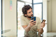 © kues1 - bearded hispanic man shopping with a credit card